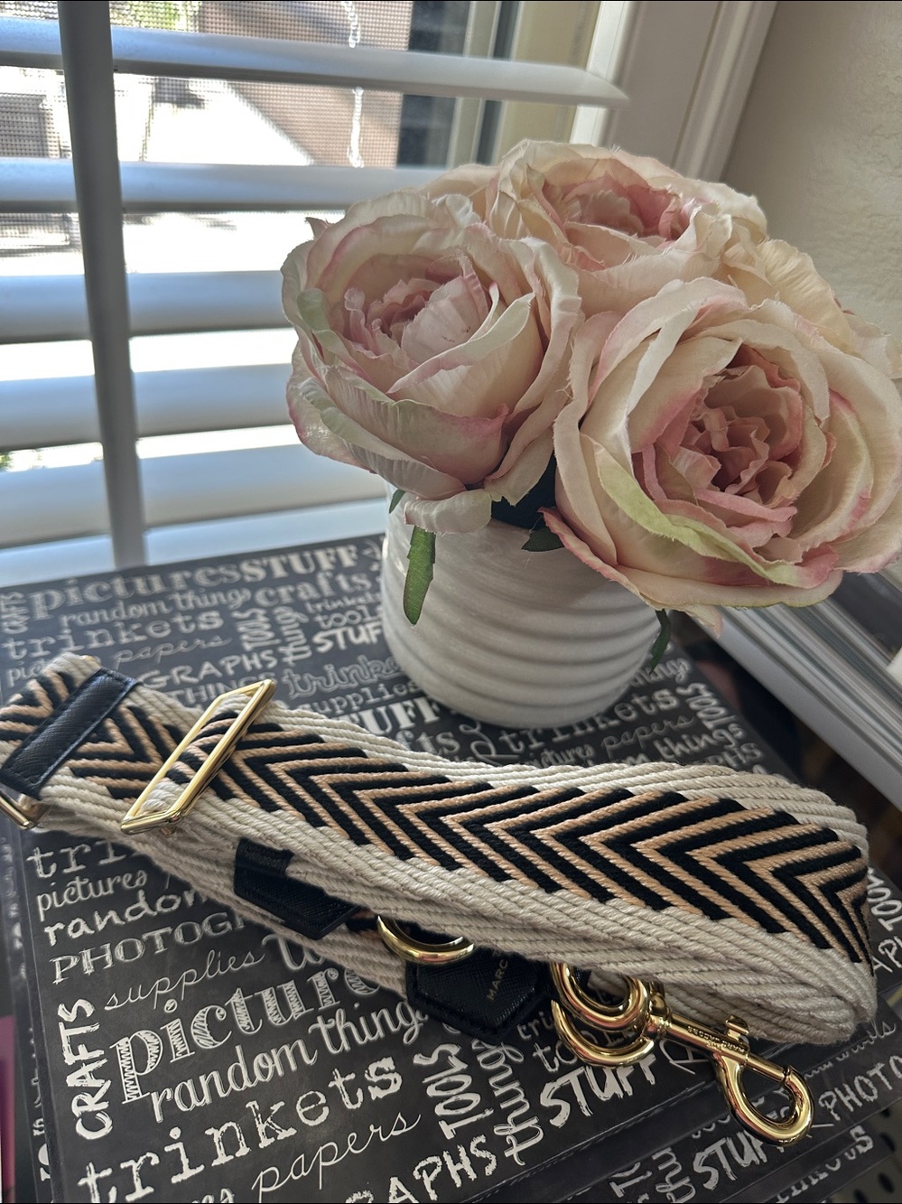 Marc Jacobs thick woven strap.